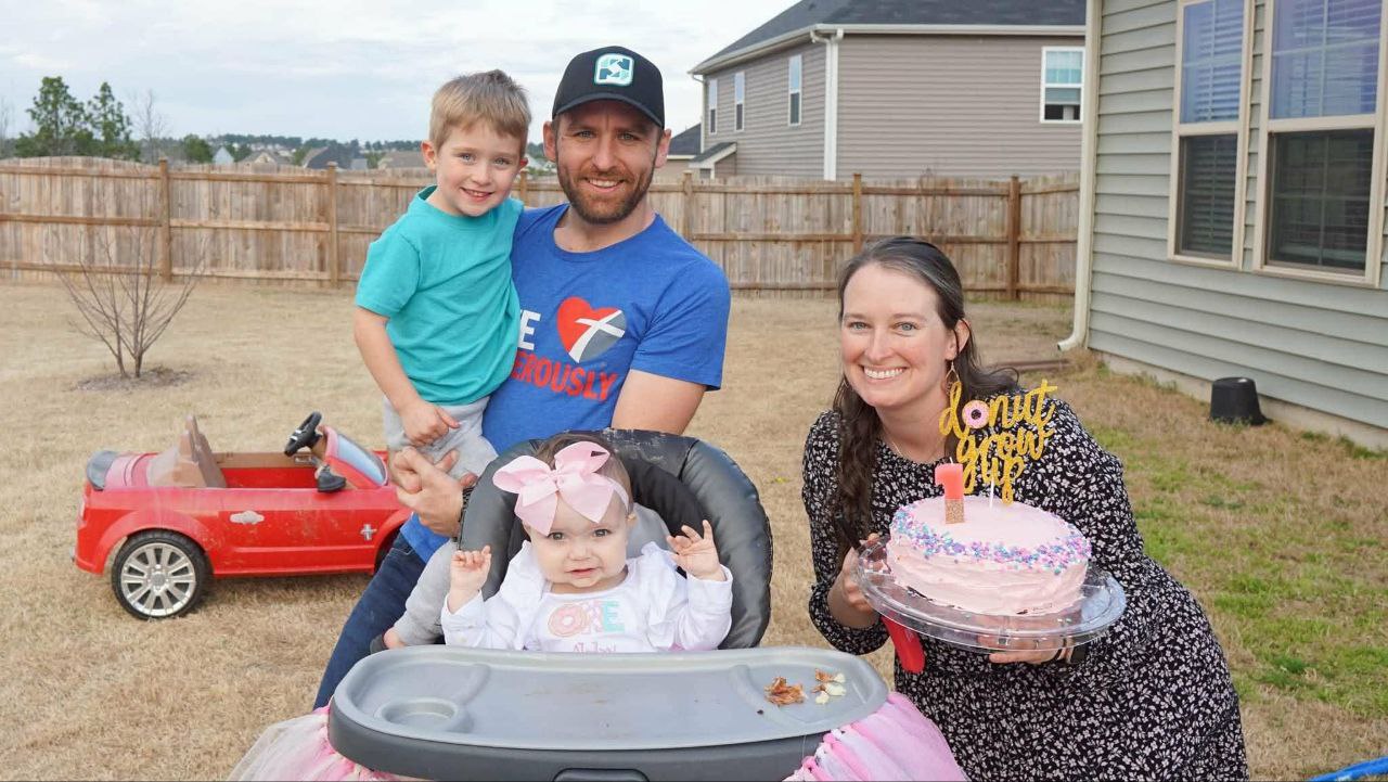 Family portrait by the water
